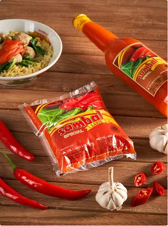 Saus Sambal Laris Special dalam botol dan pouch bersama semangkuk mi ayam